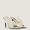 Boudoir-mules med hæl i nappaskinn med sløyfe Boudoir-mules med hæl i nappaskinn med sløyfe
