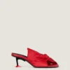 Boudoir-mules med hæl i nappaskinn med sløyfe Boudoir-mules med hæl i nappaskinn med sløyfe