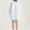 Cocoon-skjorte i poplin med Givenchy-broderi Cocoon-skjorte i poplin med Givenchy-broderi