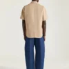 Couture-søm Indigoblå jeans med Givenchy-stempelprint Couture-søm Indigoblå jeans med Givenchy-stempelprint