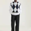 Couture-søm strikket argyle-genser