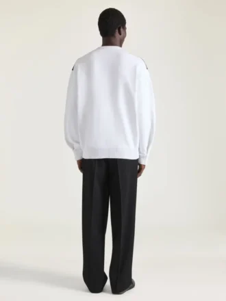 Couture-søm strikket argyle-genser