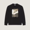 Fleece-genser med surrealistisk trykk