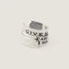 Givenchy Tape Earcuff i metall og emalje Givenchy Tape Earcuff i metall og emalje