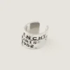 Givenchy Tape Earcuff i metall og emalje Givenchy Tape Earcuff i metall og emalje