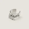 Givenchy Tape Earcuff i metall og emalje Givenchy Tape Earcuff i metall og emalje
