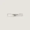 Givenchy Tape-mansjettarmbånd i metall og emalje Givenchy Tape-mansjettarmbånd i metall og emalje