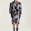 Kåpe i ulljacquard med dyremønster Kåpe i ulljacquard med dyremønster