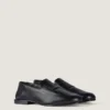 Label-loafers i skinnende skinn Label-loafers i skinnende skinn