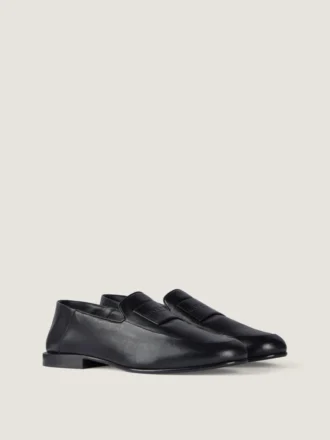 Label-loafers i skinnende skinn