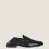 Label-loafers i skinnende skinn Label-loafers i skinnende skinn