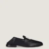 Label-loafers i skinnende skinn Label-loafers i skinnende skinn