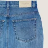 Midilang bukseskjørt i mellomblå denim Midilang bukseskjørt i mellomblå denim