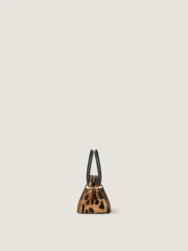 Mini Pinch-veske i skinn med ponyeffekt og leopardmønster Mini Pinch-veske i skinn med ponyeffekt og leopardmønster