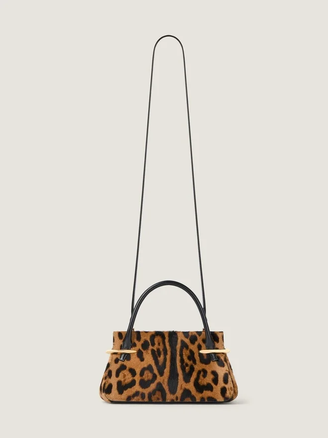 Mini Pinch-veske i skinn med ponyeffekt og leopardmønster Mini Pinch-veske i skinn med ponyeffekt og leopardmønster
