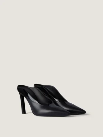 Mules med pigghæl i skinn