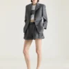 Shorts med doble plisseringer i ull Shorts med doble plisseringer i ull