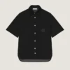 Skjorte i scuba med Givenchy Paris-lapp