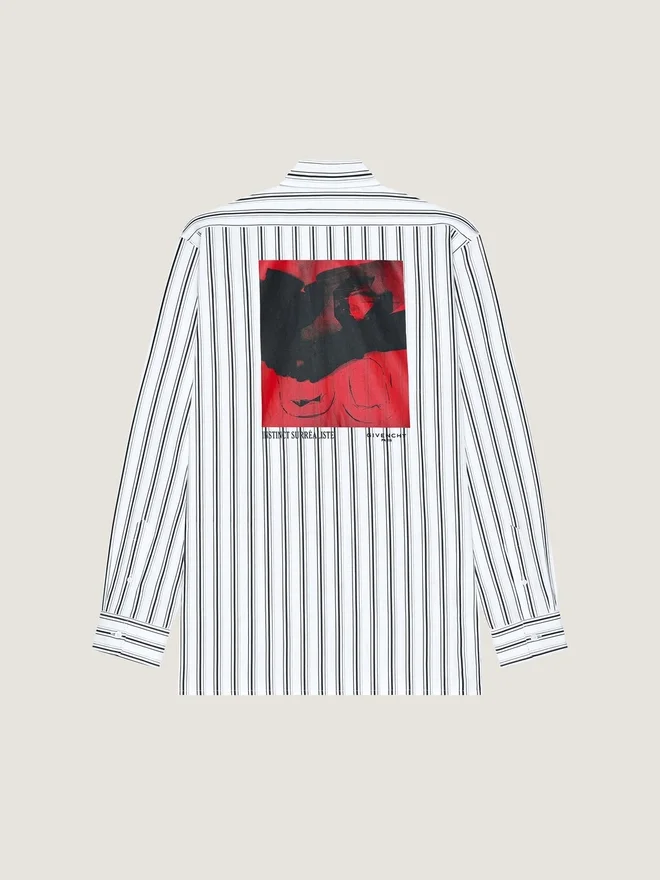 Stripet skjorte i poplin med surrealistisk trykk Stripet skjorte i poplin med surrealistisk trykk